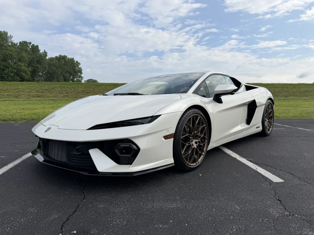 White Lamborghini supercar, front quarter view
