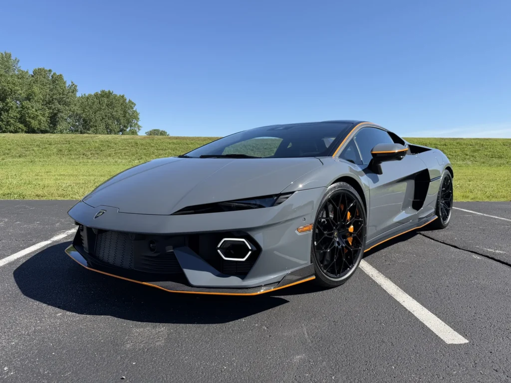 Gray McLaren supercar, front quarter view